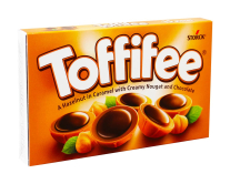 Фото продукту:Цукерки карамельні з фундуком, нугою та чорним шоколадом Toffifee, 125 г